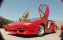 [thumbnail of 1989 Lamborghini Countach 25th Anniversary Edition red metallic-fVl open doors=mx=.jpg]